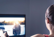 Can Movies Help You Become a Better Person woman-streaming-movie-or-watching-series-person-using-smart-tv